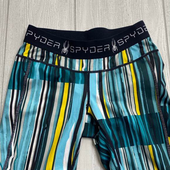 Spyder Blue Green & Yellow Freeze Stripe Print Slash Capri Leggings Size Small - Picture 8 of 11